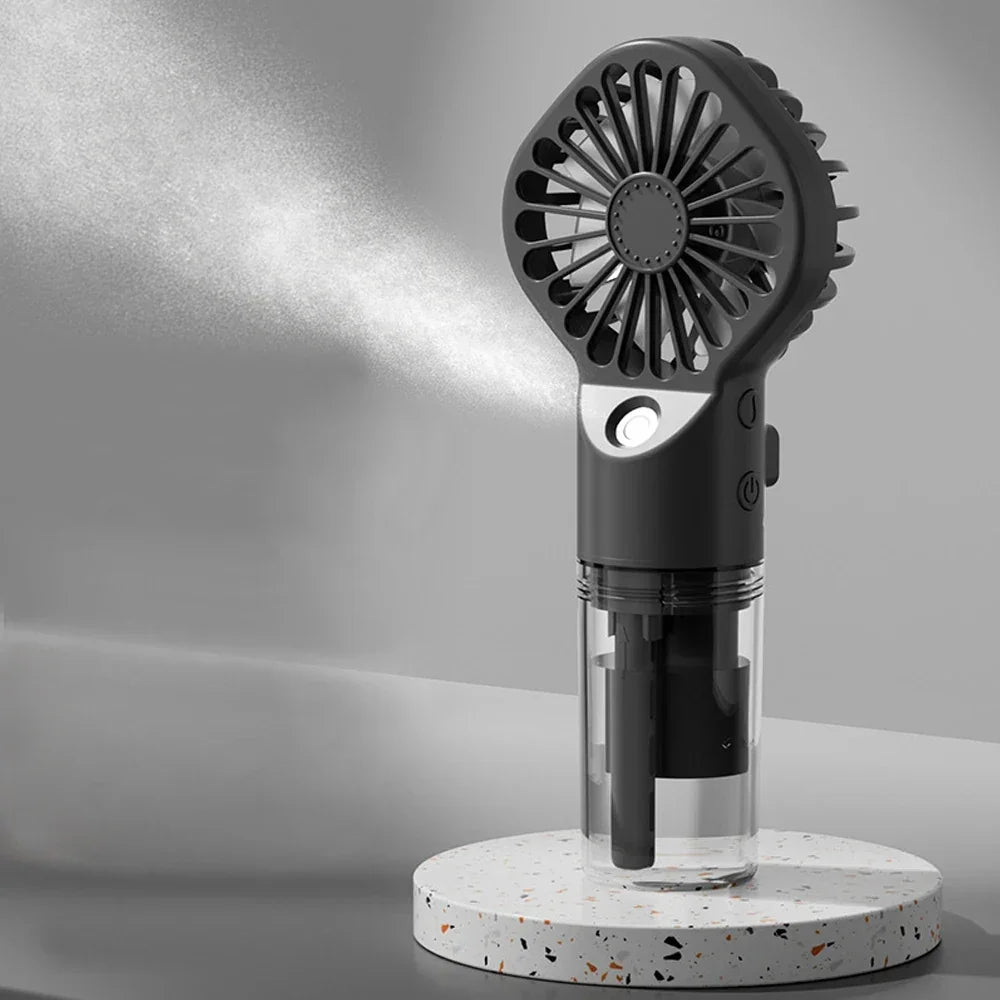 Ventilateur Brumisateur Portable – Mini Ventilateur Rafraîchissant à Main avec Réservoir d'Eau, Rechargeable USB